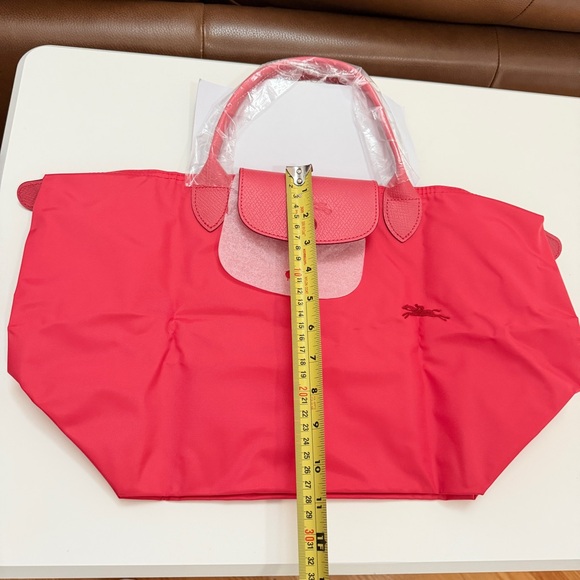 Longchamp top handle short handle tote
Grenade
L1623619P35 - Picture 11 of 12